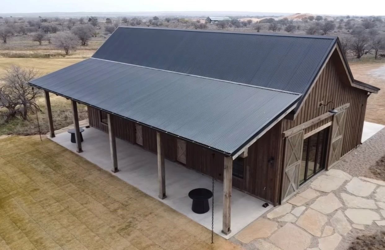 Large timber-and-metal barn structure
